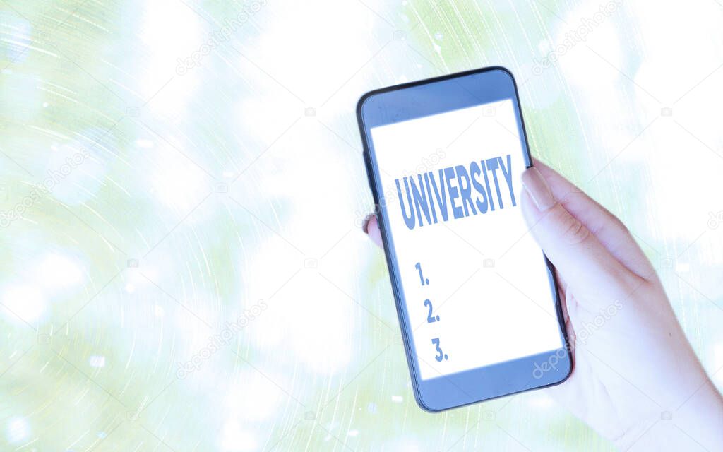Handwriting text writing University. Concept meaning an educational institution designed to teach and investigate Modern gadgets with white display screen under colorful bokeh background.