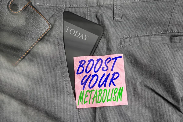 Text sign showing Boost Your Metabolism. Conceptual photo body process uses to make and burn energy from food Smartphone device inside trousers front pocket with wallet and note paper.