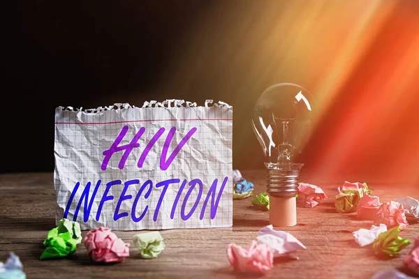 Word writing text Hiv Infection. Business concept for A disease of the immune system due to the infection of HIV Realistic colored vintage light bulbs, idea sign solution thinking concept.