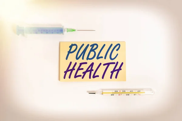 Text sign showing Public Health. Conceptual photo science of protecting and improving the health of a community Set of medical equipment with notepad for health condition assessment.