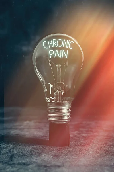 Text sign showing Chronic Pain. Conceptual photo discomfort that persists or progresses over a long period Realistic colored vintage light bulbs, idea sign solution thinking concept.