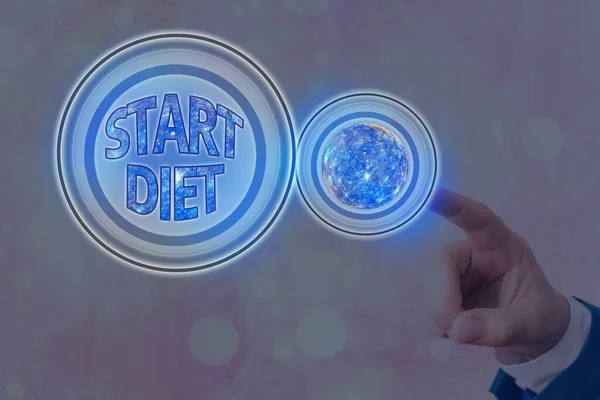 Textskylt som visar Start Diet. Konceptuell foto praxis att äta mat på ett reglerat och övervakat sätt futuristiska ikoner solsystem. Delar av denna bild tillhandahålls av NASA. — Stockfoto