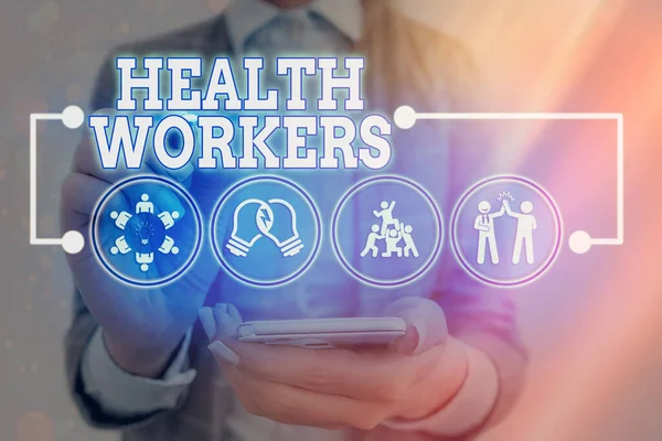 Χειρόγραφο κείμενο Εργαζόμενοι στην Υγεία. Έννοια σημαίνει να δείξουμε ποιανού δουλειά είναι να προστατεύει την υγεία των κοινοτήτων τους Εικονίδιο σύνδεσης πληροφοριακών στοιχείων δικτύου ψηφιακής τεχνολογίας. — Φωτογραφία Αρχείου