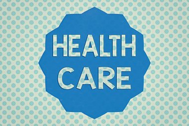 Sağlık hizmetlerini gösteren bir not yazıyorum. Zigzag etkisi altında 12 Noktalı Yıldız Dodecagon topluluğuna tıbbi bakım sağlamak amacıyla düzenlenen iş fotoğraflarının sergilenmesi.