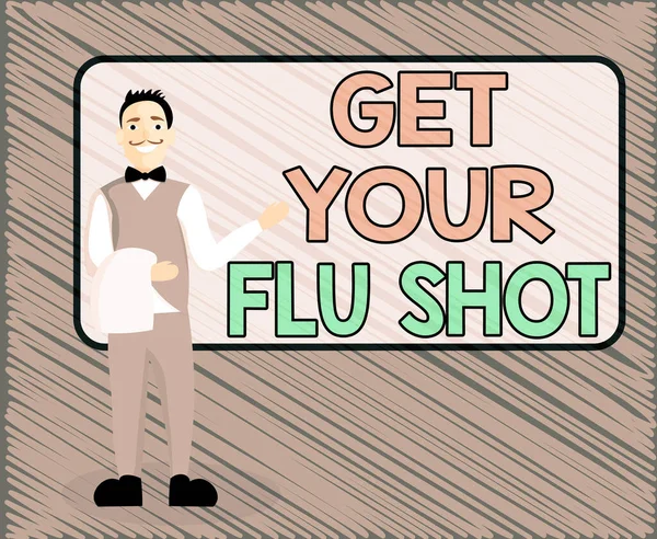 Signe texte montrant Get Your Flu Shot. Une photo-immunisation conceptuelle est administrée chaque année pour se protéger contre la grippe Garçon Homme Souriant debout en uniforme Présentant le tableau de menu vierge. — Photo