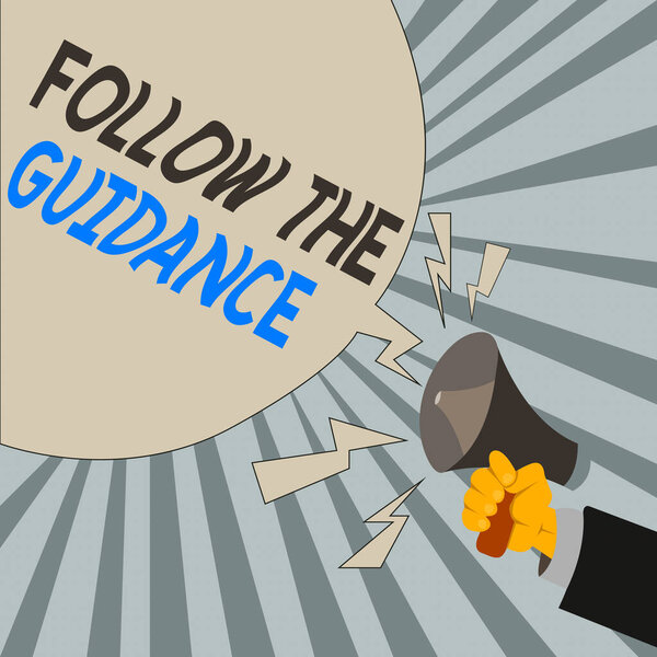 Writing note showing Follow The Guidance. Business photo showcasing controlling a course of projectile by builtin mechanism Male Hu analysis Hand Holding Megaphone Blank Speech Bubble.