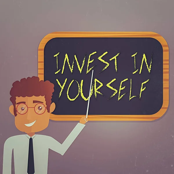 Text sign showing Invest In Yourself. Conceptual photo Improve your Skills take courses Do masters Scholarship Man Standing Holding Stick Pointing to Wall Mounted Blank Color Board.