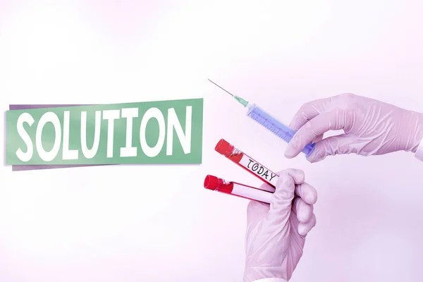 Word writing text Solution. Business concept for the ways to solve a problem or tackle a difficult situation Extracted blood sample vial ready for medical diagnostic examination.