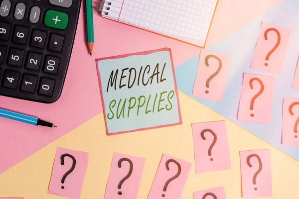 Conceptual hand writing showing Medical Supplies. Business photo showcasing Items necessary for treatment of illness or injury Mathematics stuff and writing equipment on pastel background.