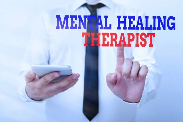 Conceptual hand writing showing Mental Healing Therapist. Business photo showcasing helping an individual express emotions in healthy ways Model pointing finger symbolizing navigation progress growth. — Stock Photo, Image