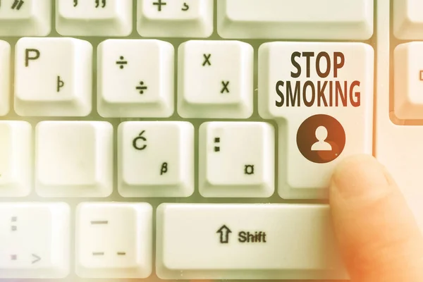 Word writing text Stop Smoking. Business concept for the process of discontinuing or quitting tobacco smoking Pc keyboard key with pointing finger above background copy space. — Stock Photo, Image
