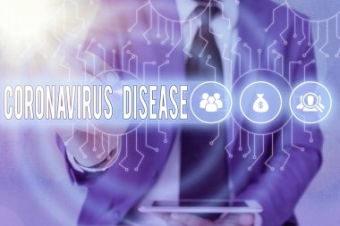 Kelime yazma Coronavirus Hastalığı. Yeni bir virüs olan SARSCoV2 Sistem Yöneticisi kontrolü, vites ayarlama araçları konsepti nedeniyle hastalık olarak tanımlanan iş konsepti.