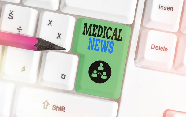 Word writing text Medical News. Business concept for report or noteworthy information on a medical breakthrough Different colored keyboard key with accessories arranged on empty copy space. — Stock Photo, Image