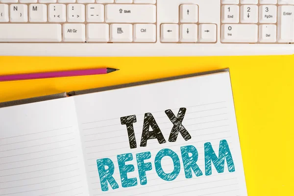 Word writing text Tax Reform. Business concept for government policy about the collection of taxes with business owners Copy space on notebook above yellow background with keyboard on table. — Stock Photo, Image