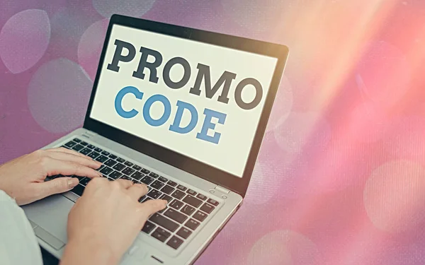 Writing note showing Promo Code. Business photo showcasing letters or numbers that allows getting a discount on something Modern gadgets white screen under colorful bokeh background.