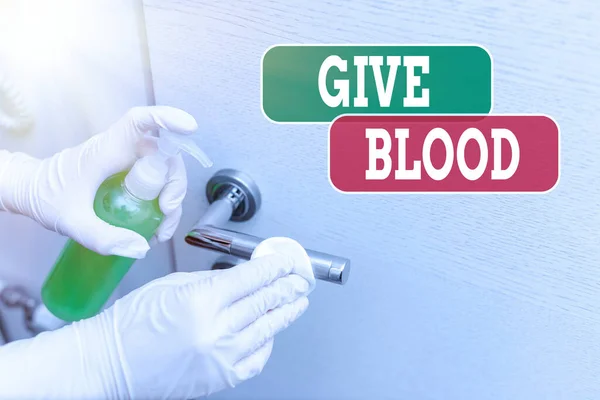 Escritura a mano conceptual que muestra Give Blood. Foto comercial que muestra a un individuo voluntariamente ha extraído sangre y se utiliza para transfusiones Gadgets electrónicos contaminados controlados por desinfectante . — Foto de Stock