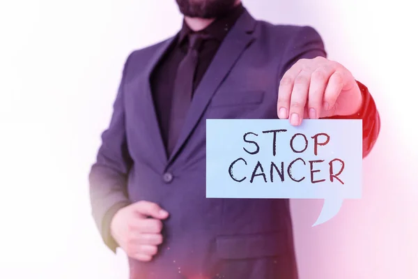 Note d'écriture montrant Stop Cancer. Photo d'affaires mettant en valeur empêcher la croissance incontrôlée des cellules anormales dans le corps Affichage de différentes notes maquettes de couleur pour mettre l'accent sur le contenu. — Photo