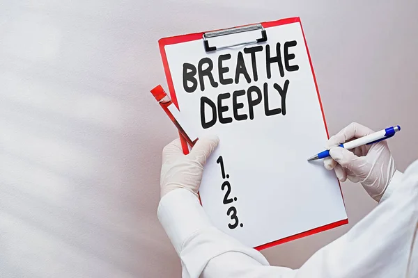 Word writing text Breathe Deeply. Business concept for to take a lot of air into the lungs inhaleexhale fully Laboratory blood test sample shown for medical diagnostic analysis result.