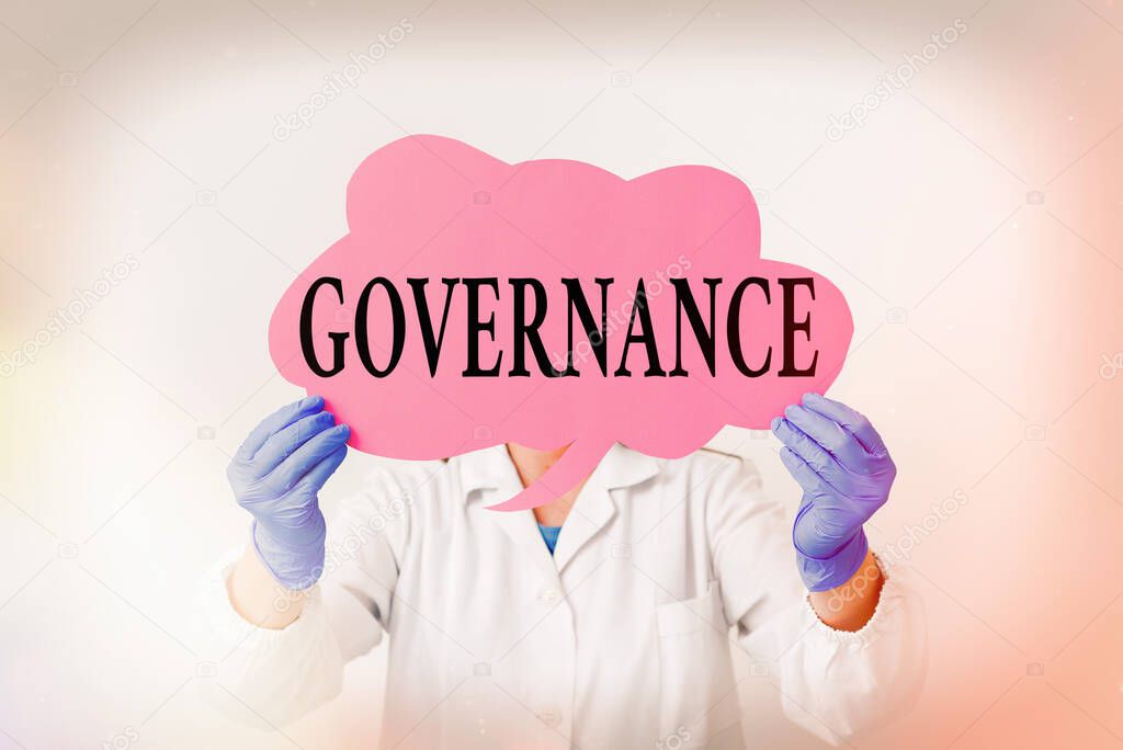 Text sign showing Governance. Conceptual photo exercised in handling an economic situation in a nation Laboratory technician featuring empty sticker paper accessories smartphone.