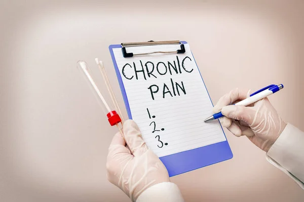 Handwriting text Chronic Pain. Concept meaning discomfort that persists or progresses over a long period Laboratory blood test sample shown for medical diagnostic analysis result.