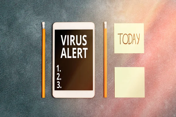 Handwriting text writing Virus Alert. Concept meaning a quick to notice any unusual and potentially dangerous Paper accesories with digital smartphone arranged on different background.
