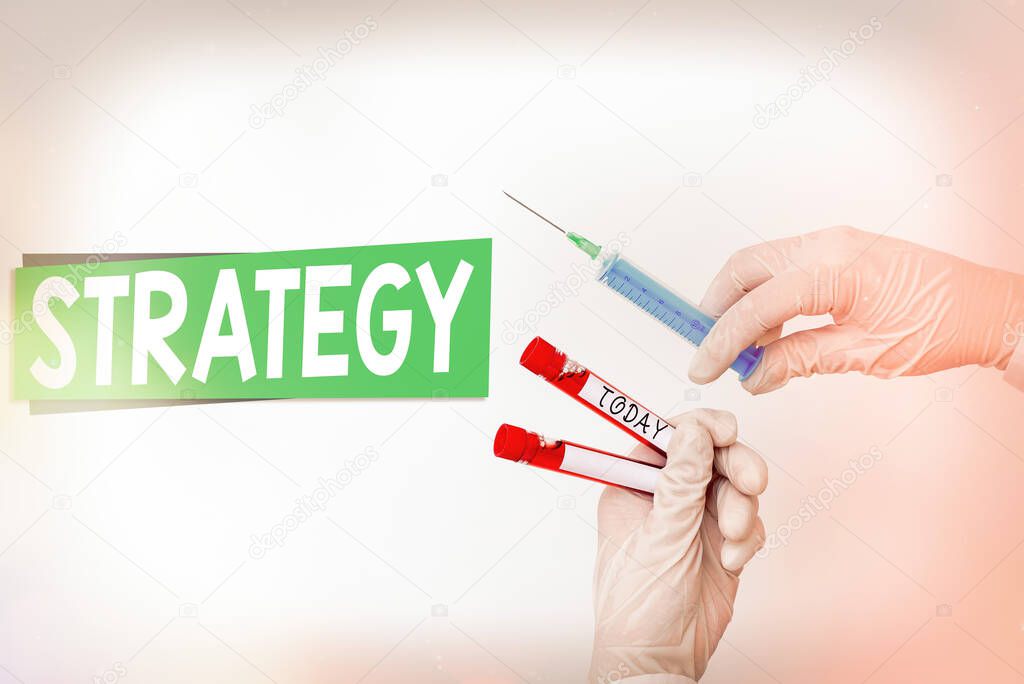 Word writing text Strategy. Business concept for action plan or strategy designed to achieve an overall goal Extracted blood sample vial ready for medical diagnostic examination.