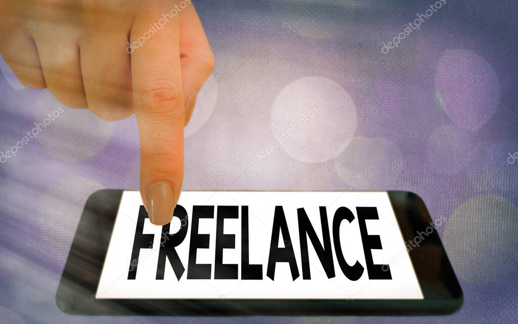 Writing note showing Freelance. Business photo showcasing working at different firms rather than being permanently Modern gadgets white screen under colorful bokeh background.