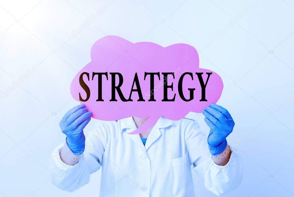 Text sign showing Strategy. Conceptual photo action plan or strategy designed to achieve an overall goal Laboratory technician featuring empty sticker paper accessories smartphone.