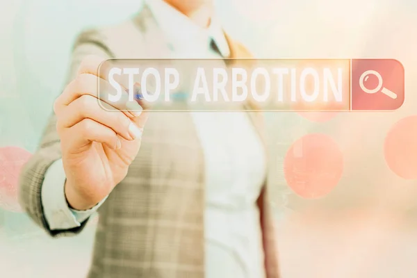 Escribiendo una nota que muestra Stop Arbotion. Foto de negocios abogando contra la práctica del aborto Movimiento Prolife Búsqueda en Internet Información digital Conexión de red de tecnología futurista . — Foto de Stock