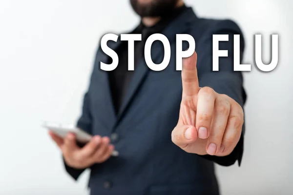 Sinal de texto a mostrar "Stop Flu". Foto conceitual colocar um fim da infecção viral de seus pulmões e vias aéreas Modelo com dedo apontador simbolizando o crescimento progresso da navegação . — Fotografia de Stock