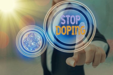 Mesajda Doping 'i Durdurun yazıyor. Kavramsal fotoğraf yasaklanmış atletik performans kullanımını bırakarak uyuşturucunun Futuristik ikon güneş sistemini geliştirdi. Bu görüntünün elementleri NASA tarafından desteklenmektedir.
