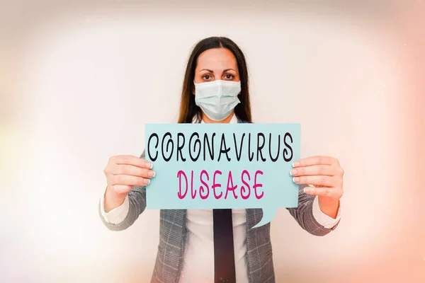 Konceptuell handstil som visar Coronavirus sjukdom. Företagsfoto text definieras som sjukdom orsakad av ett nytt virus SARSCoV2 Främja hälsa medvetenhet med försiktighetsåtgärder medicinsk utrustning. — Stockfoto