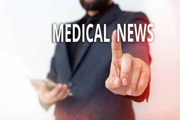 Text sign showing Medical News. Conceptual photo report or noteworthy information on a medical breakthrough Model with pointing hand finger symbolizing navigation progress growth. — Stock Photo, Image