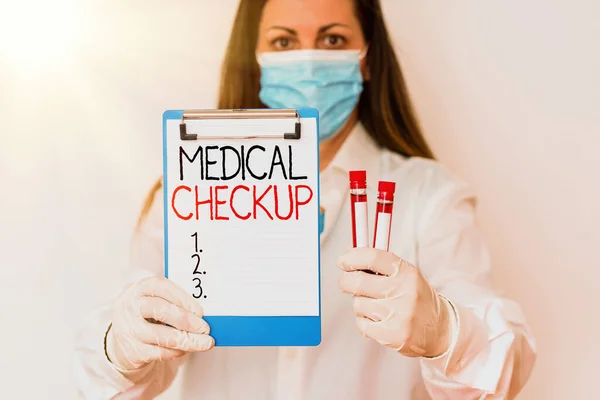 Text sign showing Medical Checkup. Conceptual photo the examination carried out to determine the physical fitness Laboratory blood test sample shown for medical diagnostic analysis result.