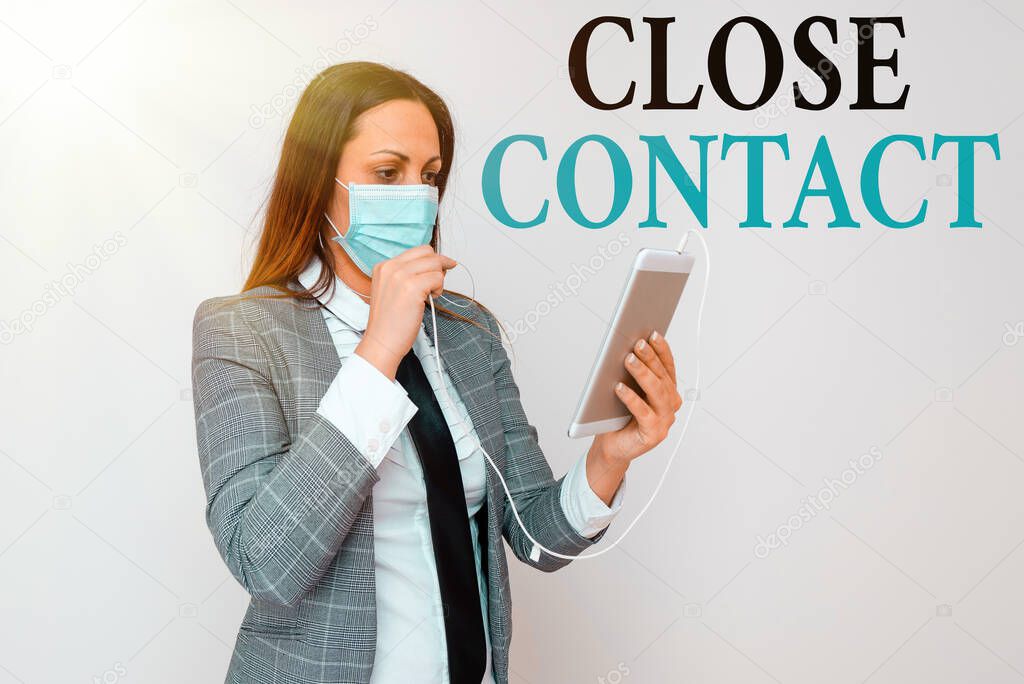Handwriting text writing Close Contact. Concept meaning having a history of direct exposure to a casepatient Promoting health awareness with set of medical precautionary equipment.