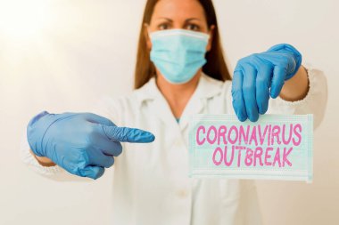 Coronavirüs salgınını gösteren bir not yazıyorum. Yeni keşfedilen COVID19 Laboratuvarı 'nın tıbbi tanı analizi için kan testi numunesinin yol açtığı bulaşıcı hastalıkları gösteren iş fotoğrafı..