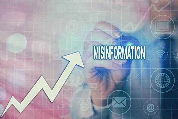 Writing note showing Misinformation. Business photo showcasing false data, in particular, intended intentionally to deceive Arrow symbol going upward showing significant achievement. — Stock Photo, Image