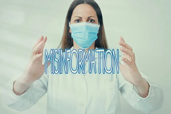 Text sign showing Misinformation. Conceptual photo false data, in particular, intended intentionally to deceive Laboratory technician featuring empty sticker paper accessories smartphone. — Stock Photo, Image