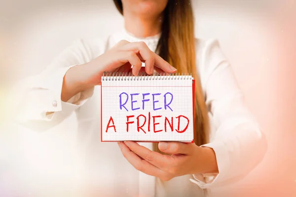 Text sign showing Refer A Friend. Conceptual photo direct someone to another or send him something like a gift Model displaying different empty color notepad mock-up for writing idea. — Stock Photo, Image