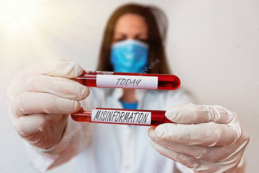 Word writing text Misinformation. Business concept for false data, in particular, intended intentionally to deceive Laboratory blood test sample shown for medical diagnostic analysis result.
