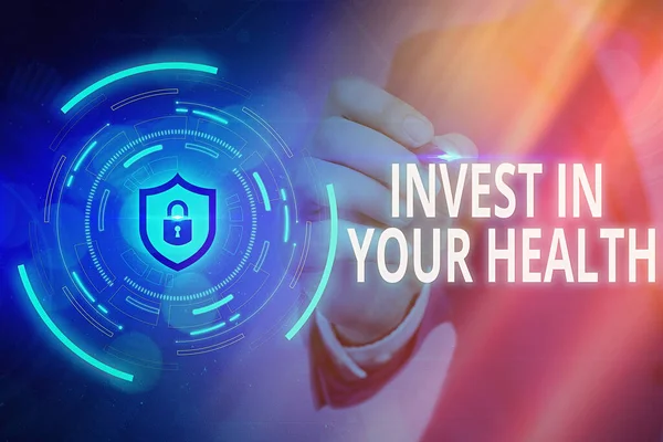 Word writing text Invest In Your Health. Business concept for put money on maintenance or improvement of your health Graphics padlock for web data information security application system.