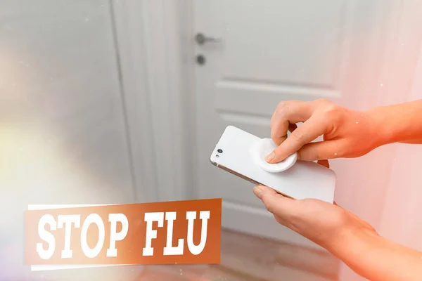 Conceptual hand writing showing Stop flu. Business photo text put an end of the viral infection of your lungs and airways Contaminated electronic gadgets controlled by disinfectant. — Stock Photo, Image