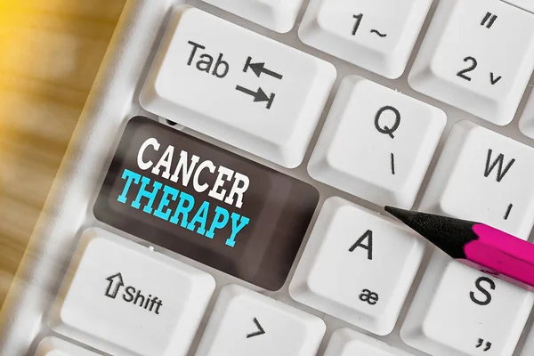 Writing note showing Cancer Therapy. Business photo showcasing the treatment of cancer in a patient often with chemotherapy Colored keyboard key with accessories arranged on empty copy space. — Stock Photo, Image