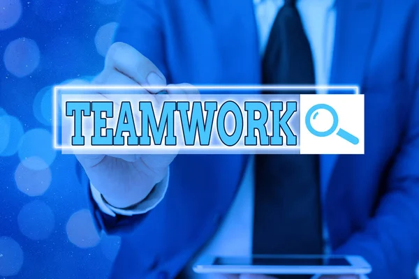 Writing note showing Teamwork. Business photo showcasing the group s is collaborative effort to accomplish a common goal Web search digital information futuristic technology network connection. — Stock Photo, Image