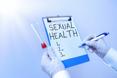 El yazısı, Cinsel Sağlık. Hayatımız boyunca cinselliği kucaklama ve zevk alma yeteneği anlamına gelen kavram. Tıbbi tanı analizi sonucu için gösterilen laboratuvar kan testi örneği..