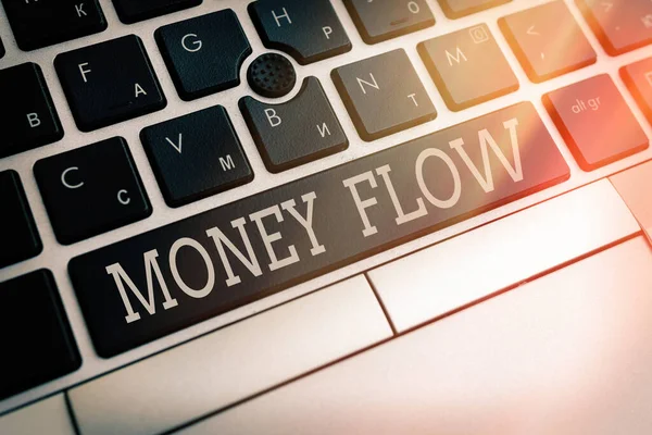 Writing note showing Money Flow. Business photo showcasing it is an indicator of positive or negative in a current day Pc keyboard key with empty note paper above background copy space. — Stock Photo, Image