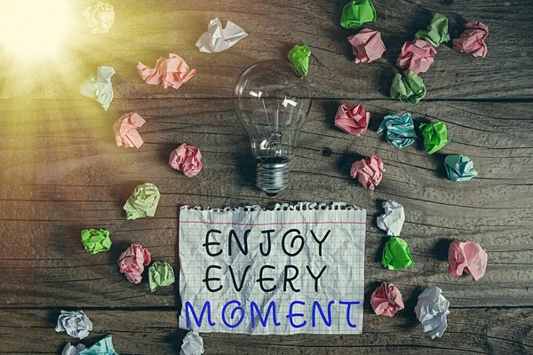 Writing note showing Enjoy Every Moment. Business photo showcasing stay positive thinking for an individualal development Realistic colored vintage light bulbs, idea sign solution. — Stock Photo, Image
