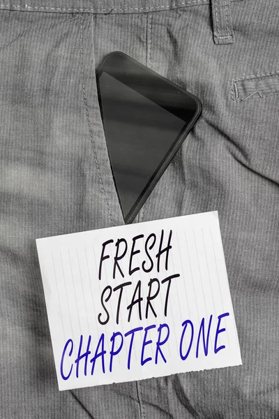 Writing note showing Fresh Start Chapter One. Business photo showcasing changes in your circumstances new career and chances Smartphone device inside trousers front pocket note paper.