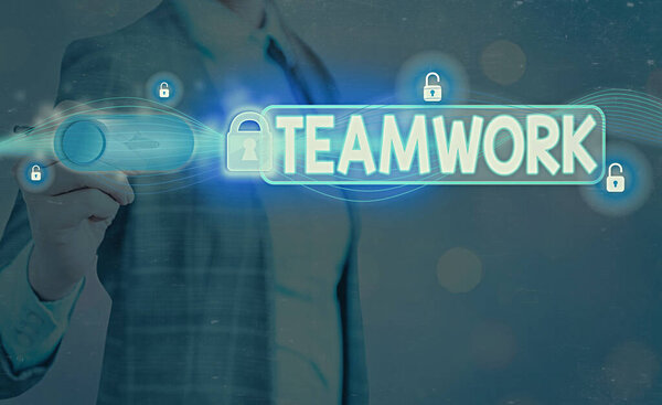 Word writing text Teamwork. Business concept for the group s is collaborative effort to accomplish a common goal Graphics padlock for web data information security application system.