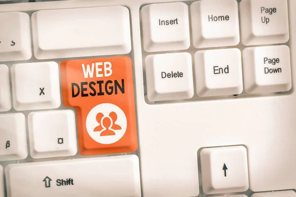 Text sign showing Web Design. Conceptual photo website creation which includes layout, content, and graphics Different colored keyboard key with accessories arranged on empty copy space.